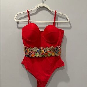 Red One-Piece Swimsuit with Colorful Embellishments